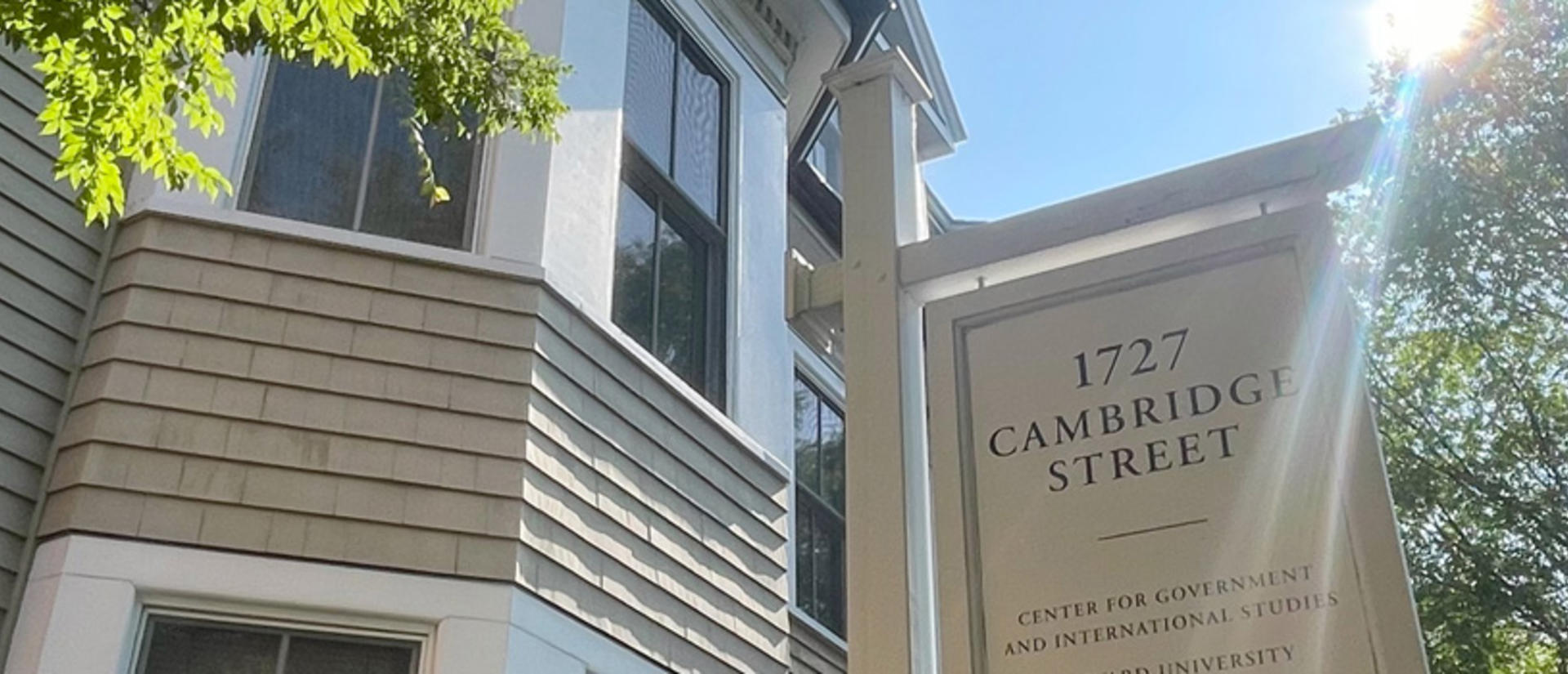 The front of 1727 Cambridge Street signage and a solar flare