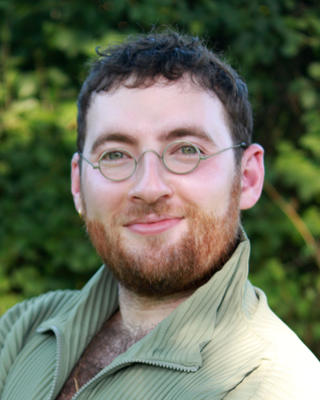 Headshot of Joseph Kaplan Weinger.