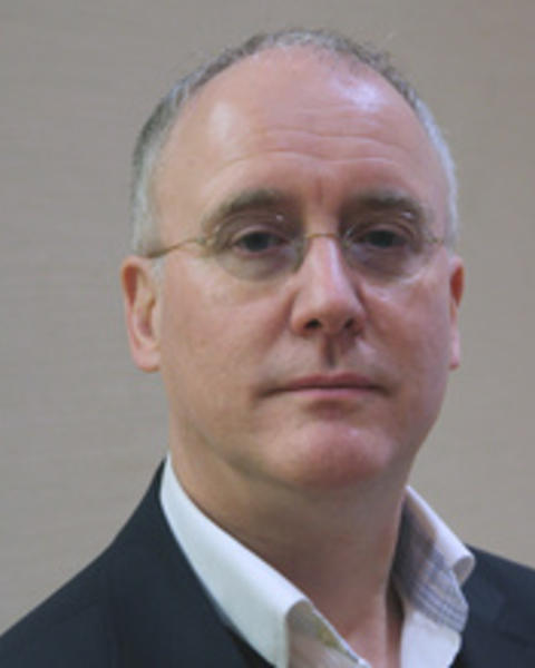 Headshot of David R. Armitage.