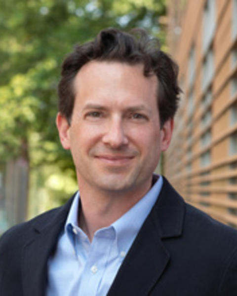 Headshot of Nicholas Harkness.
